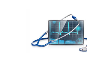 tablet with ekg on display along woth a stethoscope