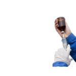 veterinary hands preparing an injection for cattle