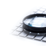 Magnifying glass on on keyboard