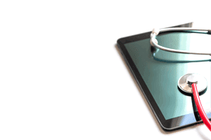 tablet with stethoscope on top