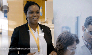 woman addressing colleagues