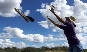 releasing hobby plane into the sky