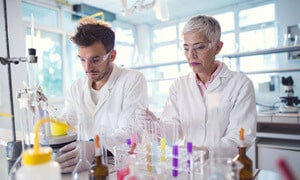 researchers in lab
